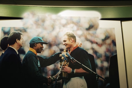 A moment when rugby, politics,and history converged: Nelson Mandela hands François Pienaar the 1995 World Cup after South Africa defeated New Zealand in extra time.
